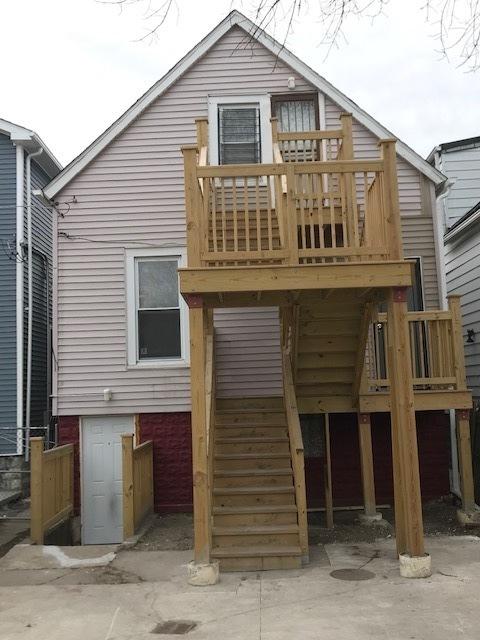 7417 S Saint Lawrence Ave, Chicago, IL 60619 - back of property with stairway