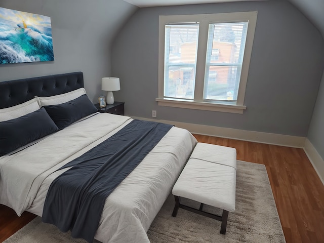 7417 S Saint Lawrence Ave, Chicago, IL 60619 - bedroom with lofted ceiling and wood finished floors