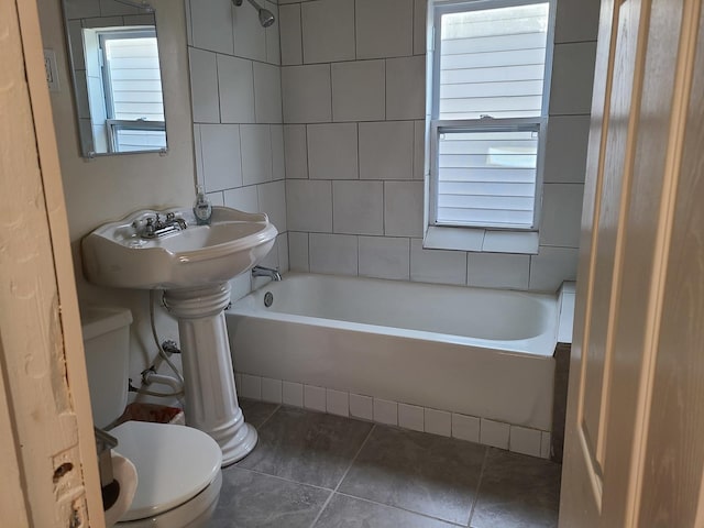 7417 S Saint Lawrence Ave, Chicago, IL 60619 - full bathroom with tile patterned floors and shower / bathtub combination