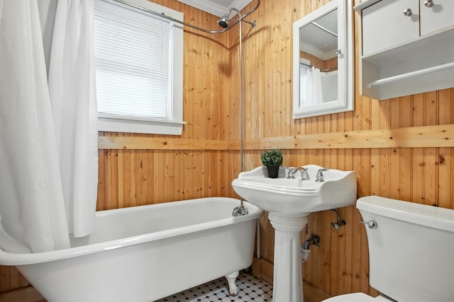 907 W Grove Ave, Waukegan, IL 60085 - bathroom featuring wood walls, healthy amount of natural light, and crown molding