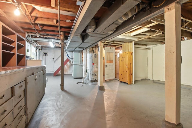 907 W Grove Ave, Waukegan, IL 60085 - below grade area featuring gas water heater and heating unit