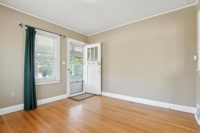 907 W Grove Ave, Waukegan, IL 60085 - foyer entrance with crown molding and light wood finished floors