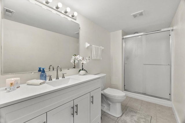 7020 Heritage Cir Unit 6-1D, Orland Park, IL 60462 - bathroom with vanity, a shower stall, and tile patterned flooring