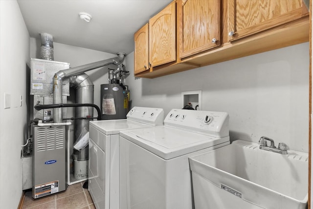7020 Heritage Cir Unit 6-1D, Orland Park, IL 60462 - washroom featuring cabinet space, independent washer and dryer, water heater, heating unit, and tile patterned flooring