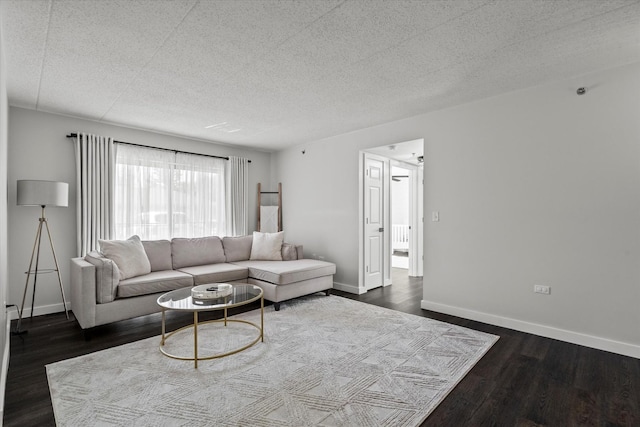 7020 Heritage Cir Unit 6-1D, Orland Park, IL 60462 - living area featuring dark wood-style flooring and a textured ceiling