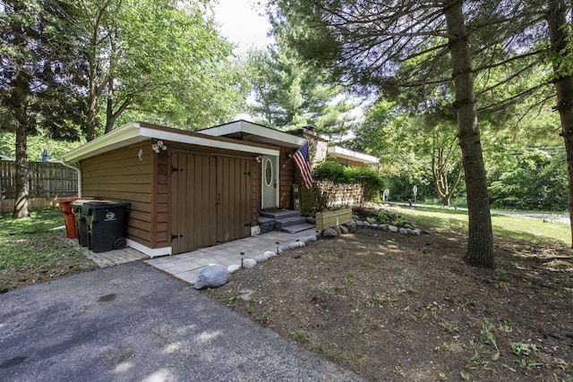 38515 N Forest Ave, Spring Grove, IL 60081 - view of front of property with board and batten siding and an outdoor structure