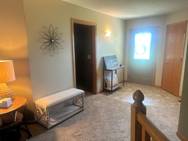 314 N Grove St, Rochelle, IL 61068 - foyer entrance with a textured ceiling and light carpet