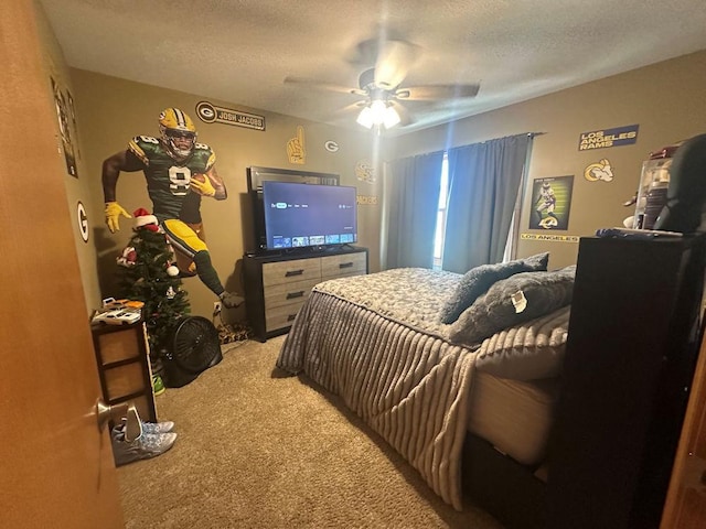 314 N Grove St, Rochelle, IL 61068 - bedroom with light carpet, a textured ceiling, and a ceiling fan