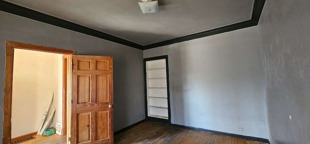 7934 S Saginaw Ave, Chicago, IL 60617 - spare room with dark wood-type flooring, vaulted ceiling, and ornamental molding