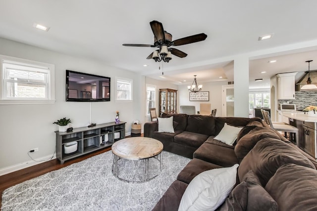1832 N 73rd Ct, Elmwood Park, IL 60707 - living area with dark wood-type flooring, ceiling fan, a chandelier, and recessed lighting