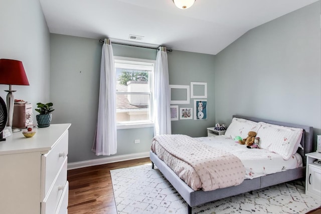 1832 N 73rd Ct, Elmwood Park, IL 60707 - bedroom featuring wood finished floors and lofted ceiling