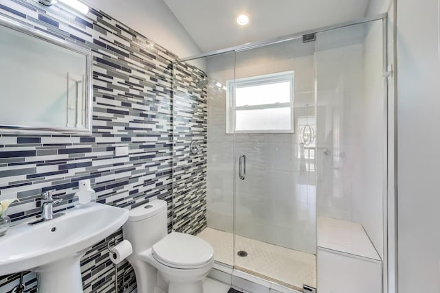 1832 N 73rd Ct, Elmwood Park, IL 60707 - full bathroom featuring a stall shower, tasteful backsplash, and tile walls