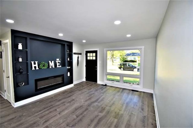 700 Delphia Ave, Elk Grove Village, IL 60007 - foyer with wood finished floors, recessed lighting, and a glass covered fireplace