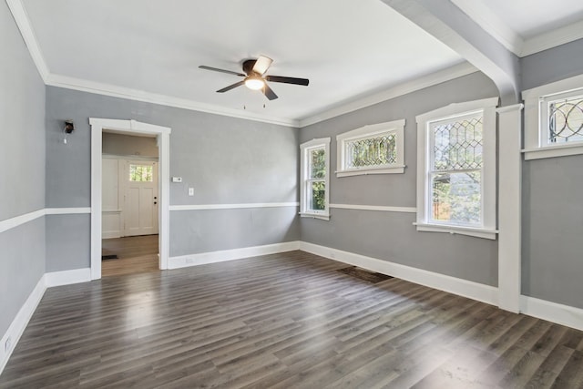 207 Smith Ave, Rockford, IL 61107 - spare room featuring plenty of natural light, a ceiling fan, crown molding, and dark wood-style floors