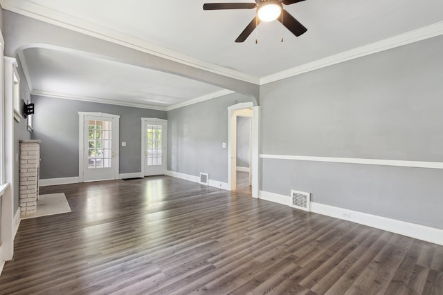 207 Smith Ave, Rockford, IL 61107 - unfurnished living room featuring arched walkways, ceiling fan, ornamental molding, and wood finished floors