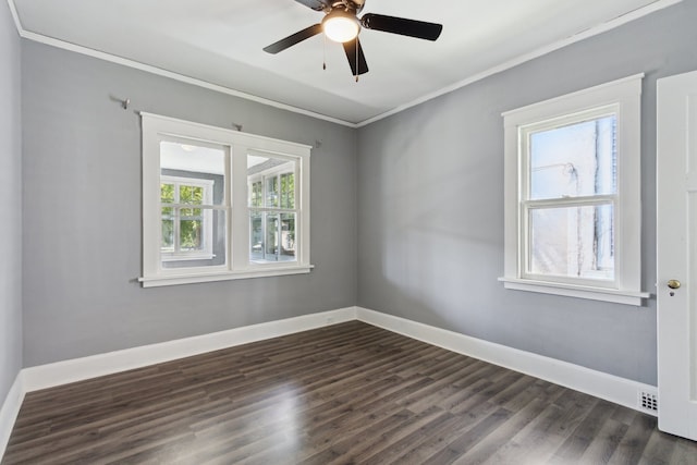 207 Smith Ave, Rockford, IL 61107 - spare room with dark wood finished floors, ornamental molding, and a ceiling fan