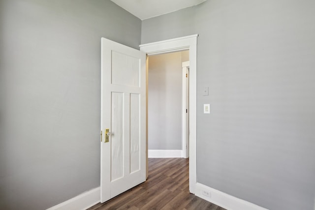 207 Smith Ave, Rockford, IL 61107 - spare room with baseboards and dark wood finished floors