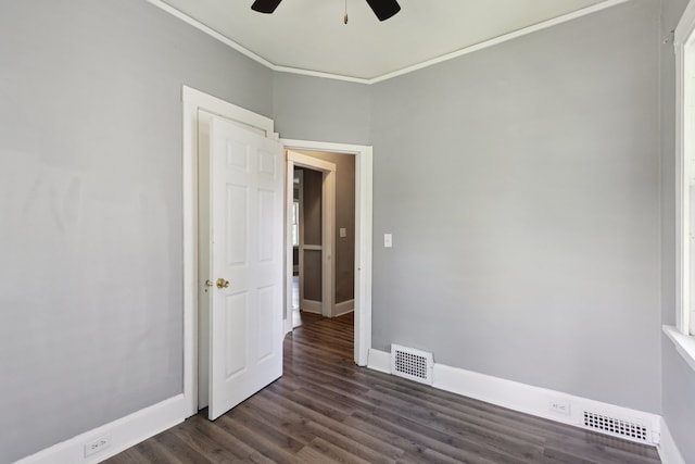 207 Smith Ave, Rockford, IL 61107 - unfurnished room with ceiling fan, dark wood finished floors, and ornamental molding