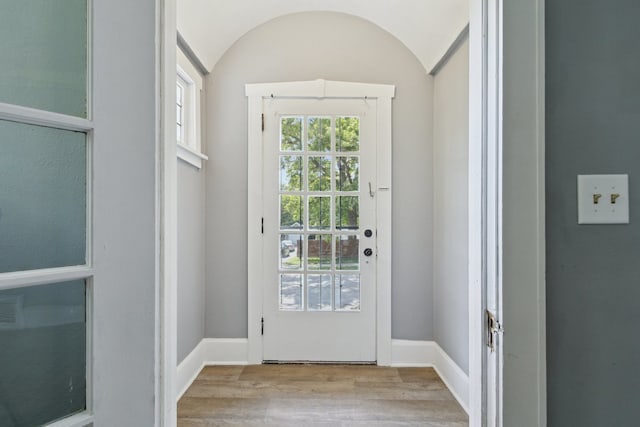 207 Smith Ave, Rockford, IL 61107 - doorway to outside with wood finished floors and lofted ceiling