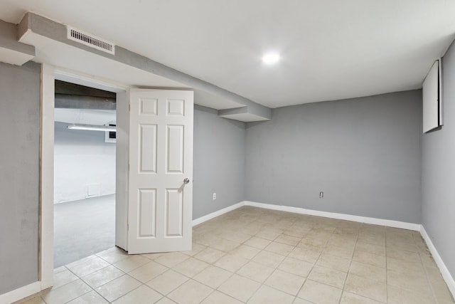 207 Smith Ave, Rockford, IL 61107 - finished below grade area featuring light tile patterned flooring and baseboards