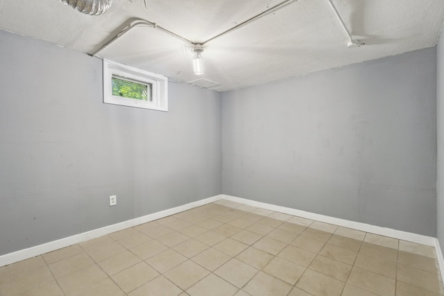 207 Smith Ave, Rockford, IL 61107 - below grade area featuring a textured ceiling