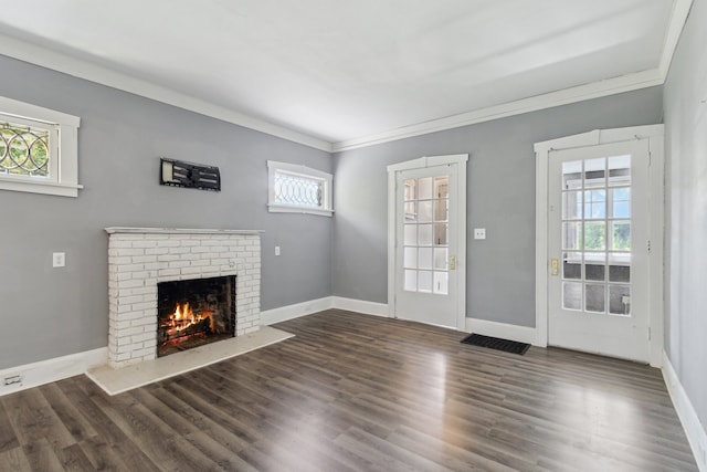 207 Smith Ave, Rockford, IL 61107 - unfurnished living room with a fireplace, ornamental molding, and wood finished floors