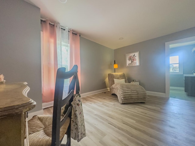 2431 Sandy Hollow Rd, Rockford, IL 61109 - sitting room featuring light wood-style flooring and vaulted ceiling