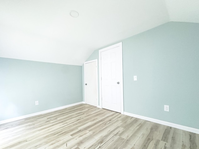 2431 Sandy Hollow Rd, Rockford, IL 61109 - additional living space featuring lofted ceiling and wood finished floors