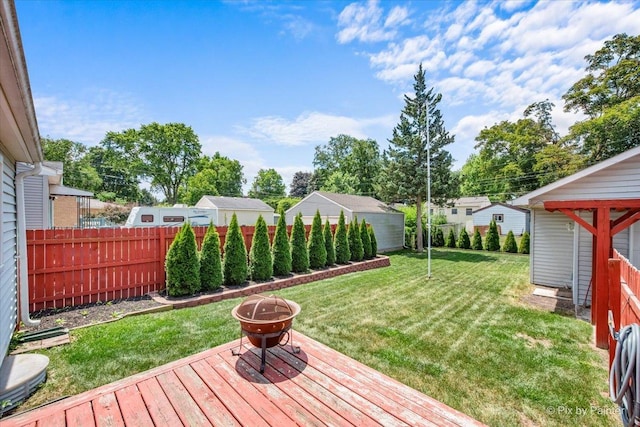 218 N Berteau Ave, Bartlett, IL 60103 - view of yard featuring a fire pit and a wooden deck