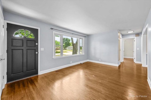 218 N Berteau Ave, Bartlett, IL 60103 - foyer entrance featuring wood finished floors and healthy amount of natural light