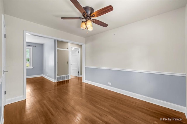 218 N Berteau Ave, Bartlett, IL 60103 - unfurnished bedroom featuring wood finished floors, a closet, and ceiling fan