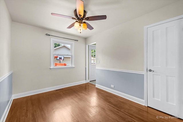 218 N Berteau Ave, Bartlett, IL 60103 - unfurnished room with wood finished floors and ceiling fan