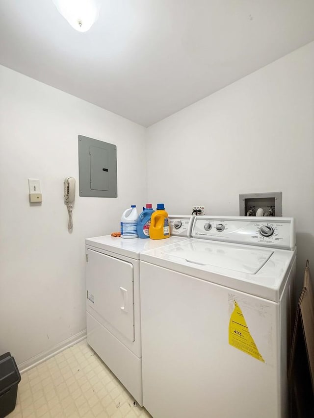 258 Brookside Ln Unit B, Willowbrook, IL 60527 - laundry room with electric panel, washer and clothes dryer, and light floors