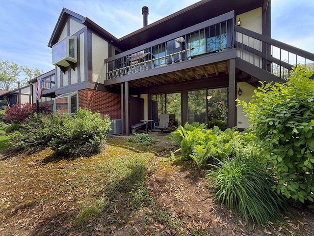 258 Brookside Ln Unit B, Willowbrook, IL 60527 - back of house featuring stucco siding and brick siding