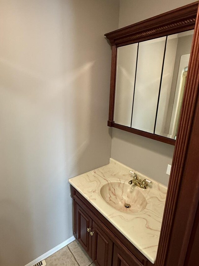 127 S Front St, Hennepin, IL 61327 - bathroom with vanity and tile patterned floors