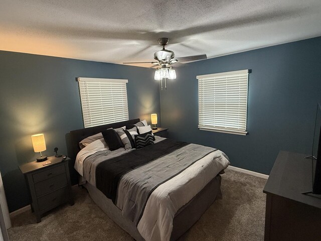 127 S Front St, Hennepin, IL 61327 - bedroom with carpet flooring, a ceiling fan, and a textured ceiling