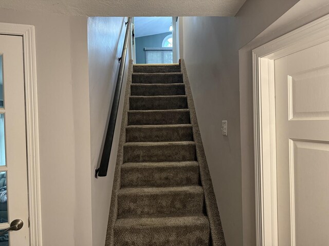 127 S Front St, Hennepin, IL 61327 - stairs with a textured ceiling