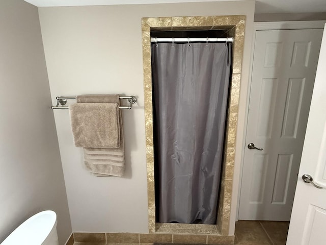 127 S Front St, Hennepin, IL 61327 - full bath with a shower with curtain and tile patterned flooring