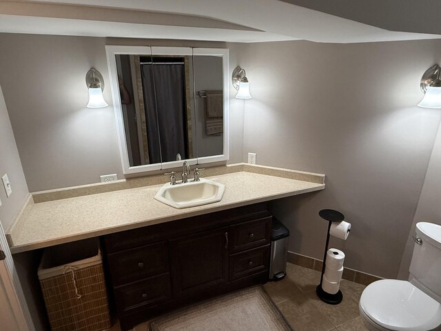 127 S Front St, Hennepin, IL 61327 - full bathroom with vanity, tile patterned floors, and a shower with curtain