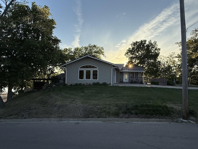 127 S Front St, Hennepin, IL 61327 - ranch-style house with a front yard and a patio area