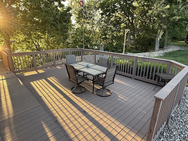 127 S Front St, Hennepin, IL 61327 - deck with outdoor dining space and view of scattered trees