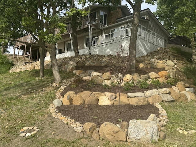 127 S Front St, Hennepin, IL 61327 - view of home's exterior featuring a deck