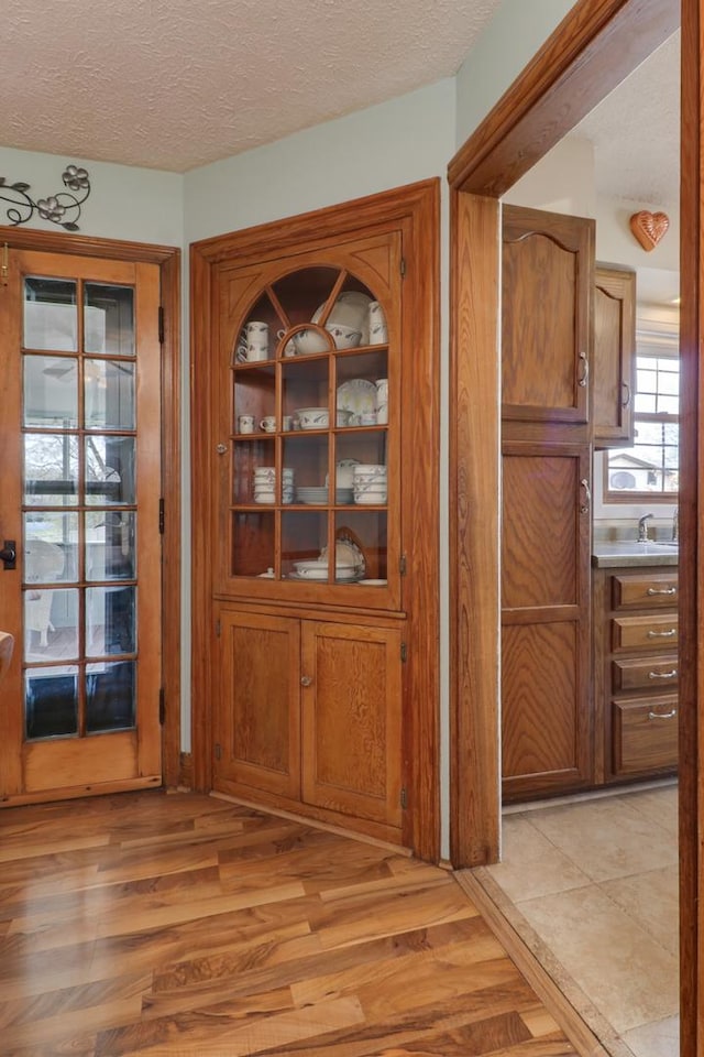 1211 Hovey Ave, Normal, IL 61761 - detailed view of wood finished floors and a textured ceiling