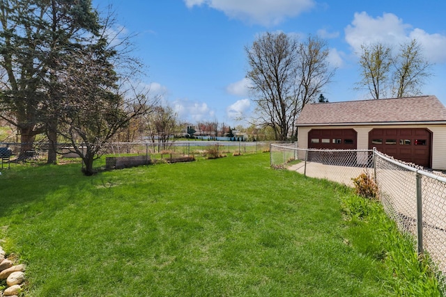 1211 Hovey Ave, Normal, IL 61761 - fenced backyard featuring a garage