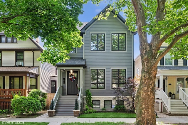 4845 N Leavitt St, Chicago, IL 60625 - view of front facade featuring roof with shingles