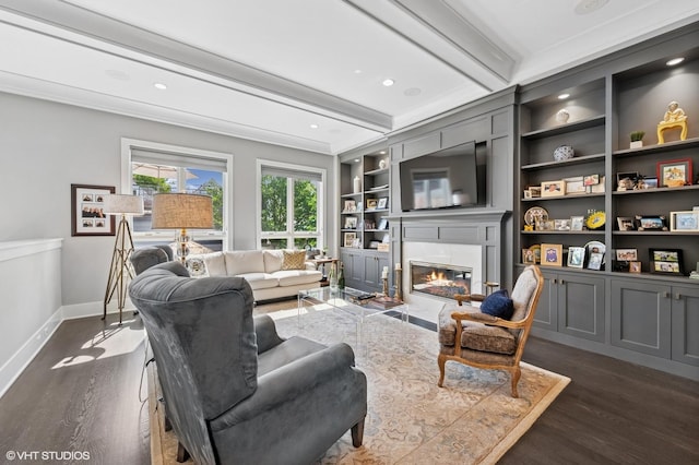 4845 N Leavitt St, Chicago, IL 60625 - living area featuring dark wood-style floors, beamed ceiling, a glass covered fireplace, built in features, and recessed lighting