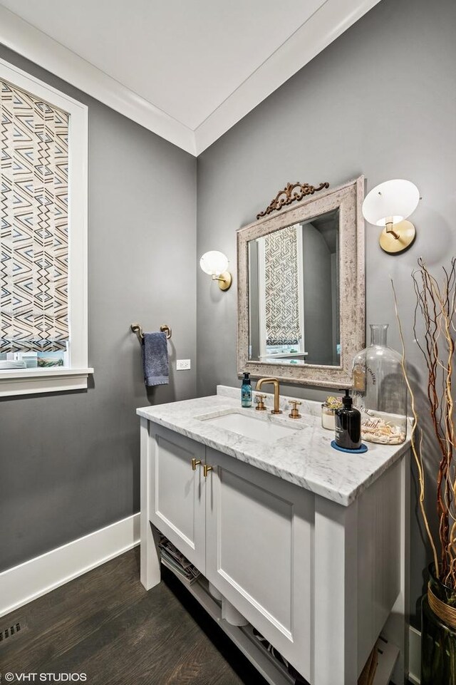4845 N Leavitt St, Chicago, IL 60625 - bathroom featuring wood finished floors and vanity