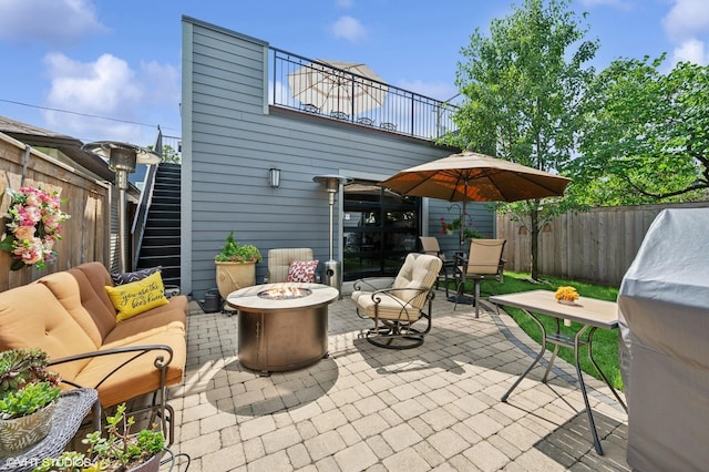 4845 N Leavitt St, Chicago, IL 60625 - view of patio / terrace with an outdoor living space with a fire pit and stairway