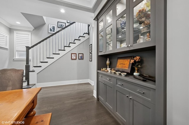 4845 N Leavitt St, Chicago, IL 60625 - bar with dark wood-style floors, stairway, and recessed lighting
