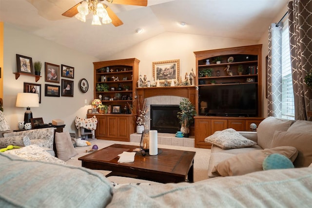 2321 Hayden Way, Normal, IL 61761 - living room featuring vaulted ceiling, a ceiling fan, and a tile fireplace